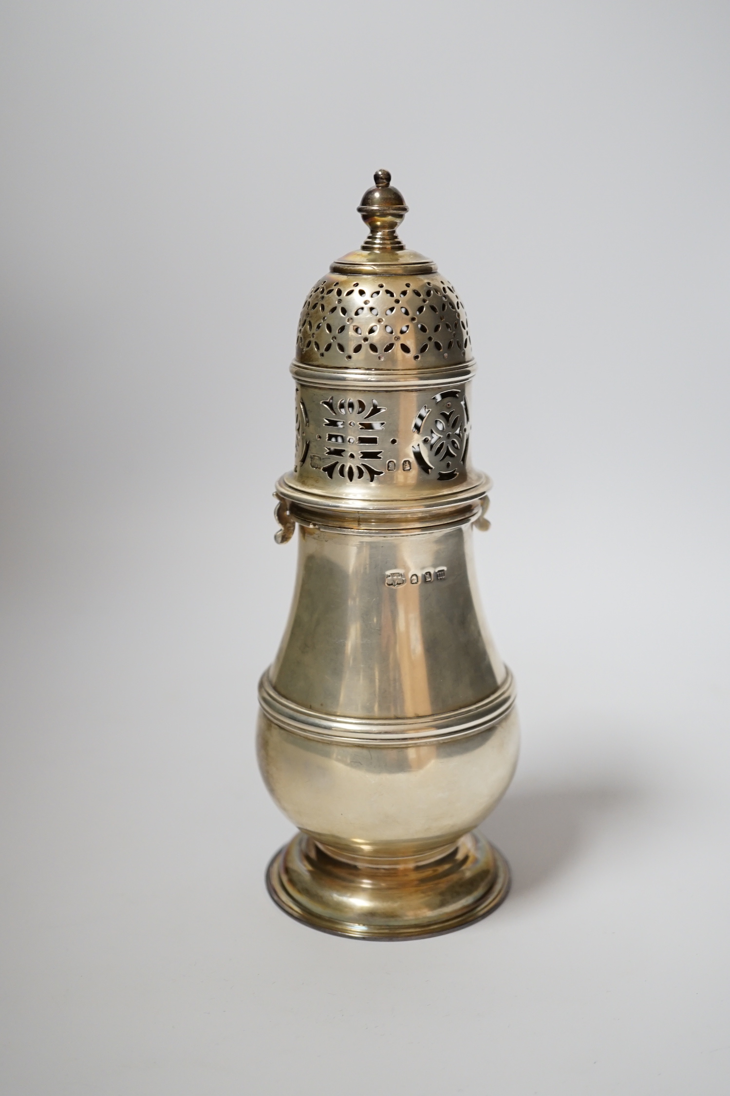 A George V Brittania standard silver baluster sugar caster, Daniel & John Welby, London, 1927, 21cm, 16oz.